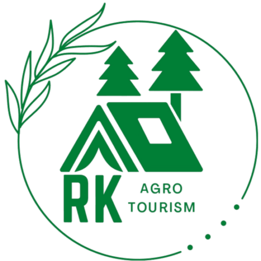 Green logo for RK Agro Tourism featuring a stylized house with a triangular roof, two evergreen trees, and a circular leafy border on the left side. The text RK AGRO TOURISM is below the graphic.